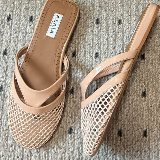 Alaia 25 Mules Planas de Red Infradito de Piel de Cordero Nude 303707