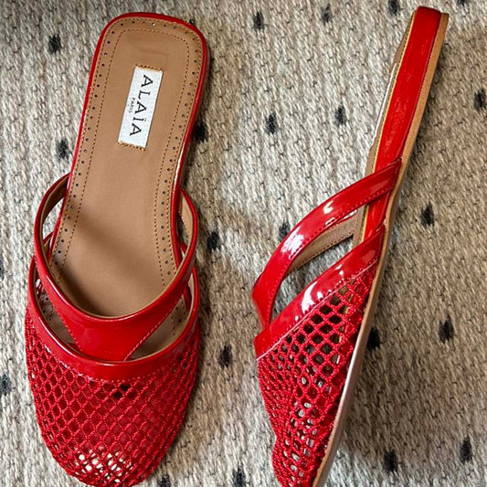 Alaia 25 Mules Planos de Red Infradito de Piel de Cordero Roja 303710