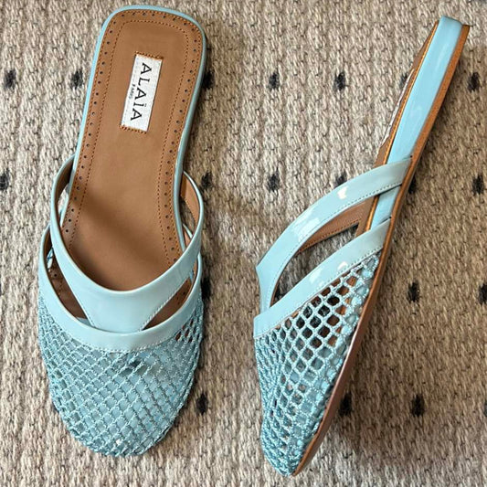 Alaia 25 Mules Planas de Red de Pescado Infradito Verde Laguna de Piel de Cordero 303711