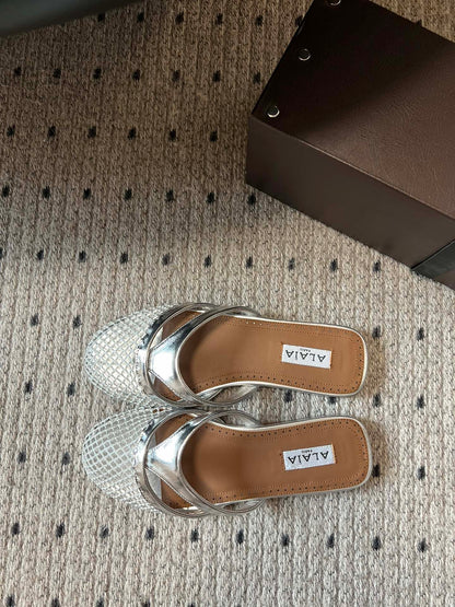 Alaia 25 Mules Planas de Red Plateada de Piel de Cordero 303712